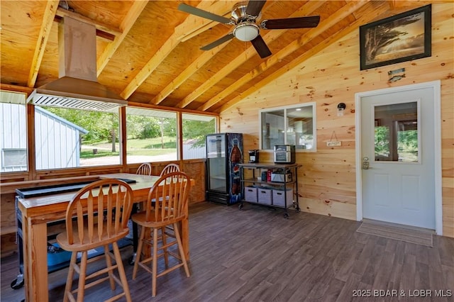 30734 Ottersway Rd, Gravois Mills, MO 65037 - dining area featuring wood walls, wood finished floors, and a ceiling fan