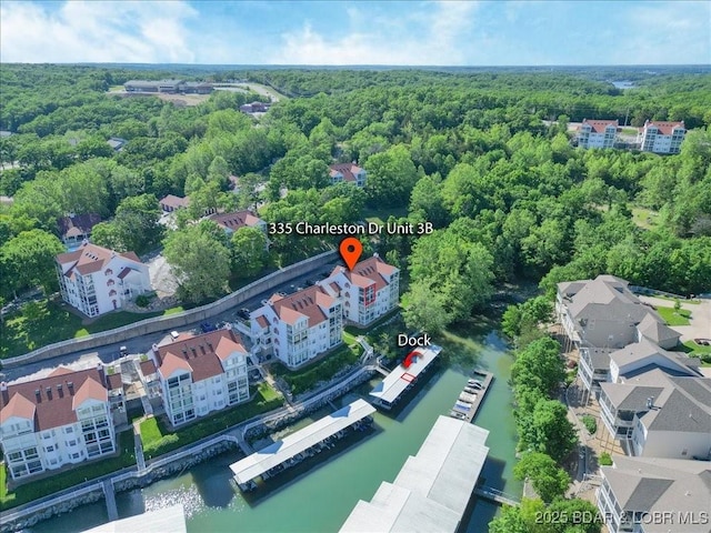 335 Charleston Dr Unit 3B, Lake Ozark, MO 65049 - aerial view of a forest and a large body of water