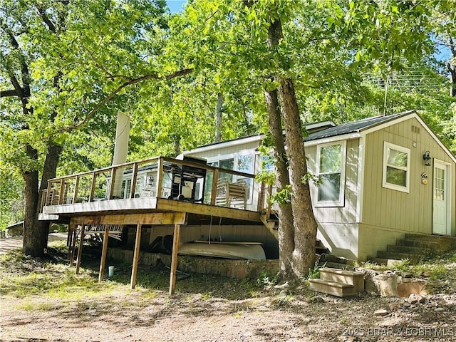 33722 Waterfront Dr, Stover, MO 64078 - rear view of property featuring a deck