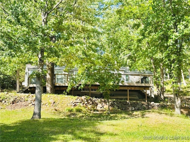 33722 Waterfront Dr, Stover, MO 64078 - view of grassy yard featuring a deck and stairs