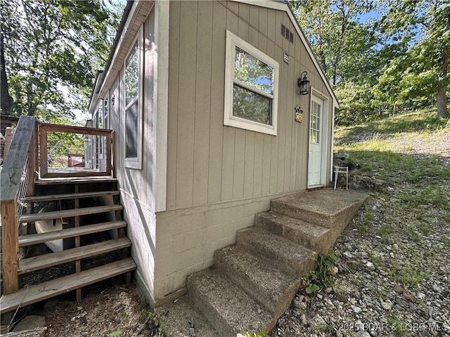 33722 Waterfront Dr, Stover, MO 64078 - view of home's exterior featuring entry steps and stairway