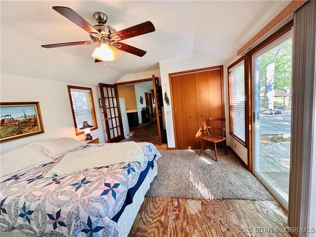 33722 Waterfront Dr, Stover, MO 64078 - bedroom with lofted ceiling, access to outside, a ceiling fan, french doors, and a closet