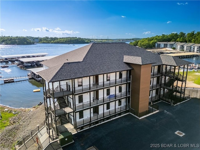 4935 Robins Cir Unit 2C, Osage Beach, MO 65065 - view of property with a water view and stairway