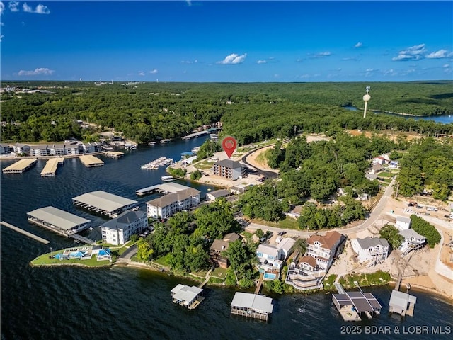 4935 Robins Cir Unit 2C, Osage Beach, MO 65065 - aerial view of property and surrounding area featuring a heavily wooded area and a large body of water