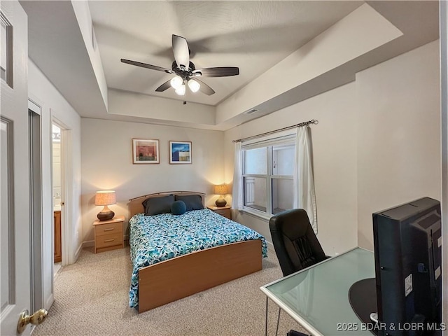 4800 Eagleview Dr Unit 6104, Osage Beach, MO 65065 - bedroom featuring light carpet, a raised ceiling, an office area, baseboards, and ceiling fan