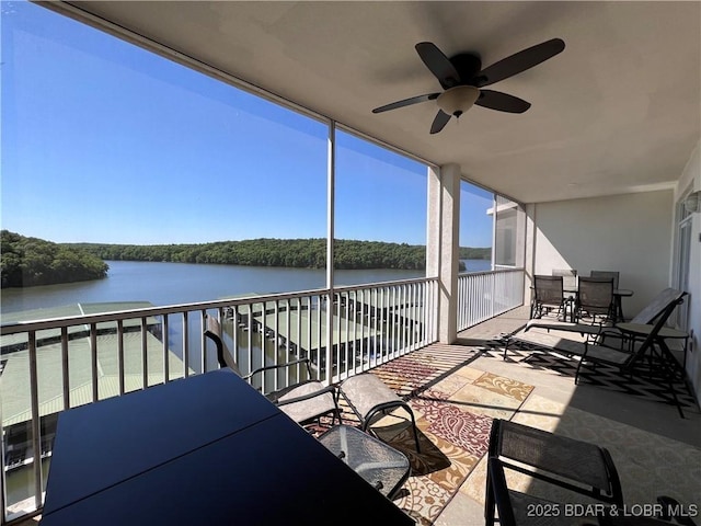 4800 Eagleview Dr Unit 6104, Osage Beach, MO 65065 - balcony featuring a water view, outdoor dining area, and a ceiling fan