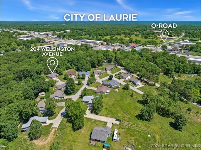 204 Wellington Ln, Laurie, MO 65037 - view of property location featuring a heavily wooded area