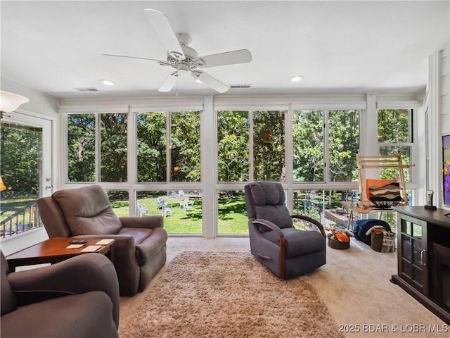 204 Wellington Ln, Laurie, MO 65037 - sunroom with carpet floors