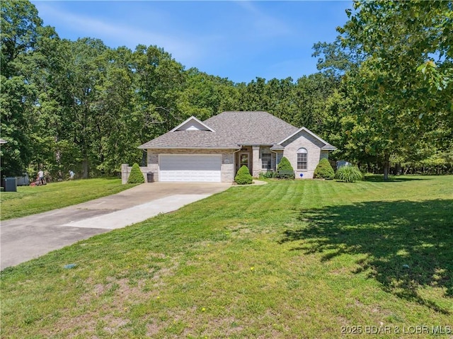 204 Wellington Ln, Laurie, MO 65037 - ranch-style house featuring a garage, a front yard, brick siding, and concrete driveway