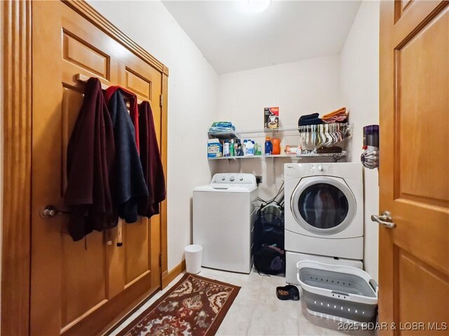 204 Wellington Ln, Laurie, MO 65037 - laundry room with independent washer and dryer and tile patterned floors