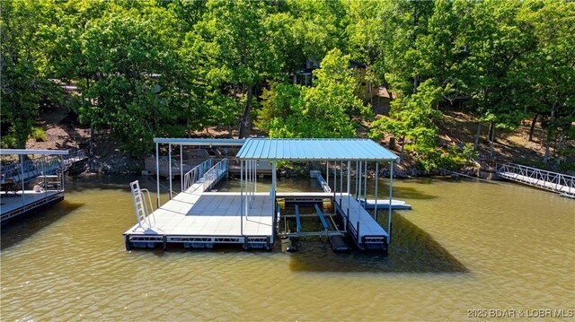 491 Walkers Cay, Osage Beach, MO 65065 - dock with a water view and boat lift