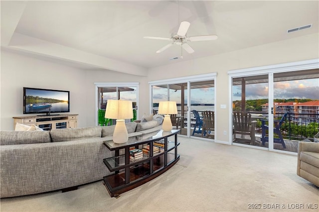 184 E Palisades Condo Dr Unit 4A, Lake Ozark, MO 65049 - living room featuring carpet and ceiling fan