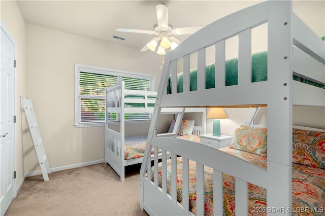 184 E Palisades Condo Dr Unit 4A, Lake Ozark, MO 65049 - bedroom with light carpet, baseboards, and ceiling fan