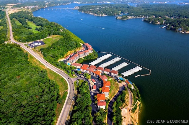 184 E Palisades Condo Dr Unit 4A, Lake Ozark, MO 65049 - view of property location featuring a nearby body of water and a forest