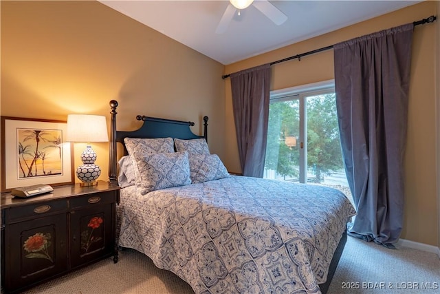 55 Shagbark Dr, Sunrise Beach, MO 65079 - bedroom featuring light carpet, baseboards, and ceiling fan