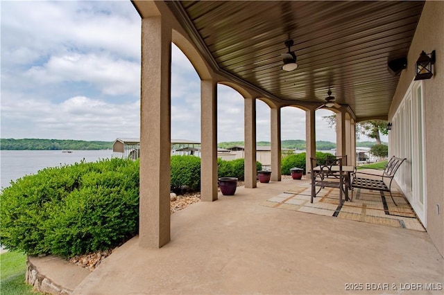 55 Shagbark Dr, Sunrise Beach, MO 65079 - view of patio with a water view and ceiling fan