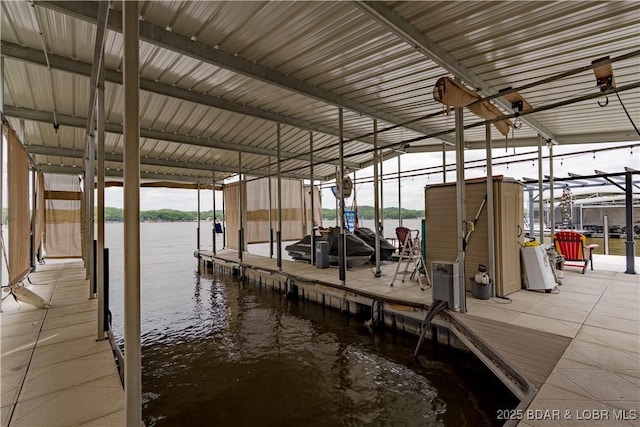 55 Shagbark Dr, Sunrise Beach, MO 65079 - dock area with a water view and boat lift