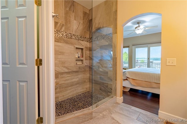 55 Shagbark Dr, Sunrise Beach, MO 65079 - full bathroom featuring a walk in shower, ceiling fan, and connected bathroom