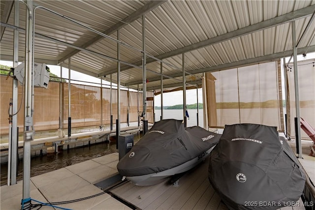 55 Shagbark Dr, Sunrise Beach, MO 65079 - dock featuring boat lift and a water view