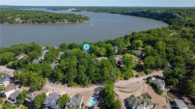 1396 Robyn Ct, Osage Beach, MO 65065 - aerial view of property and surrounding area featuring a nearby body of water, nearby suburban area, and a heavily wooded area