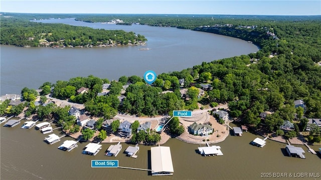 1396 Robyn Ct, Osage Beach, MO 65065 - aerial overview of property's location featuring a heavily wooded area and a large body of water