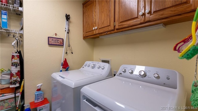 1396 Robyn Ct, Osage Beach, MO 65065 - washroom featuring independent washer and dryer and cabinet space