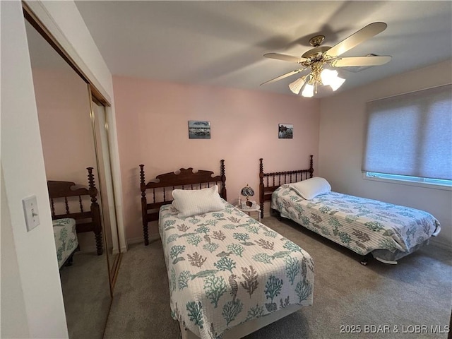 1396 Robyn Ct, Osage Beach, MO 65065 - bedroom with carpet flooring, a closet, and ceiling fan