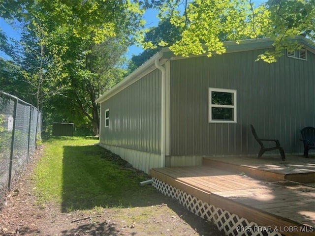 34443 Ivy Bend Rd, Stover, MO 65078 - view of side of home with a deck