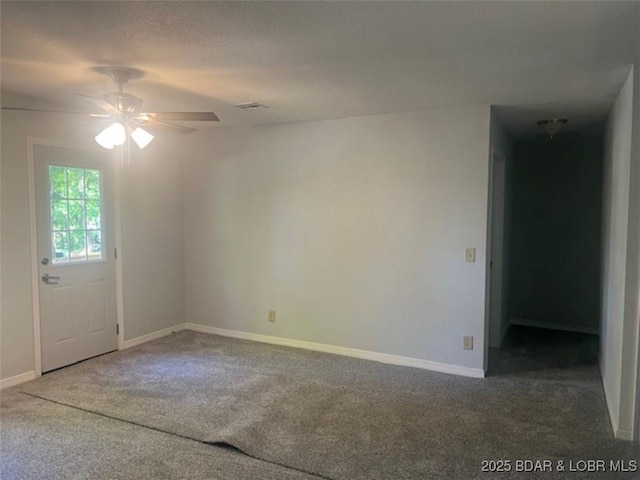 34443 Ivy Bend Rd, Stover, MO 65078 - carpeted spare room featuring a ceiling fan and baseboards