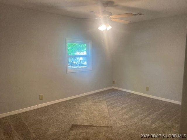 34443 Ivy Bend Rd, Stover, MO 65078 - spare room with ceiling fan, carpet floors, and baseboards