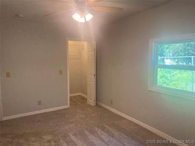 34443 Ivy Bend Rd, Stover, MO 65078 - carpeted empty room featuring a ceiling fan and baseboards