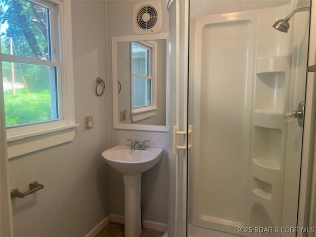 34443 Ivy Bend Rd, Stover, MO 65078 - full bath with a stall shower, baseboards, and a sink