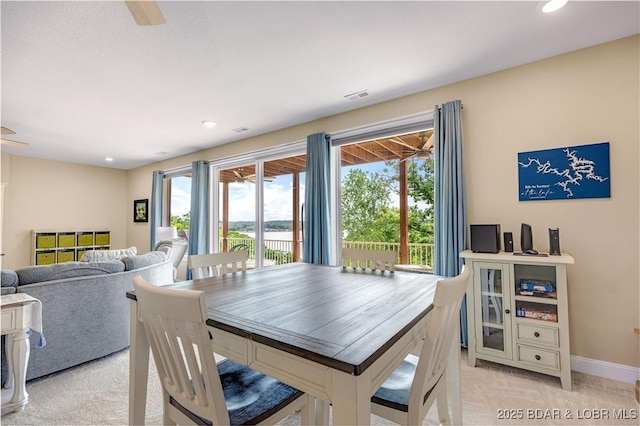 980 Eagle Dr, Lake Ozark, MO 65049 - dining area featuring light colored carpet, recessed lighting, baseboards, and a ceiling fan