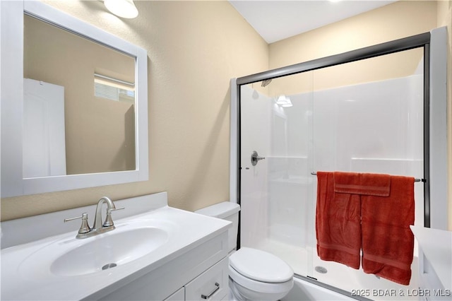 980 Eagle Dr, Lake Ozark, MO 65049 - bathroom featuring a stall shower, vanity, and toilet