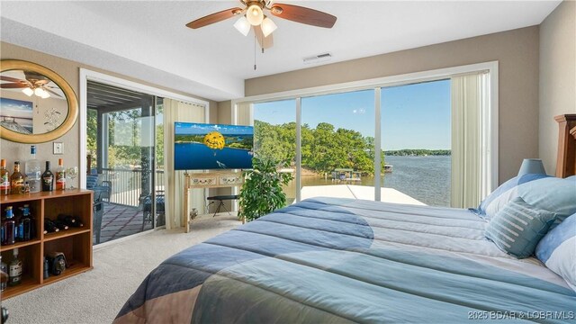 312 Windsor Bay Dr Unit 2A, Camdenton, MO 65020 - bedroom featuring carpet flooring, access to outside, and a ceiling fan