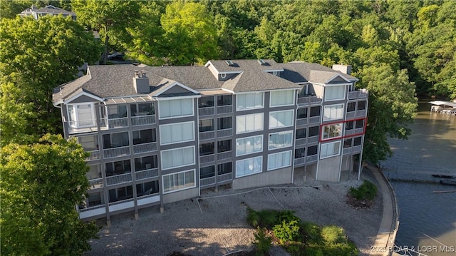 312 Windsor Bay Dr Unit 2A, Camdenton, MO 65020 - view of building exterior featuring a forest view