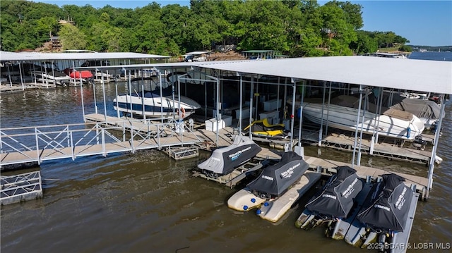 312 Windsor Bay Dr Unit 2A, Camdenton, MO 65020 - dock with a water view, boat lift, and a forest view