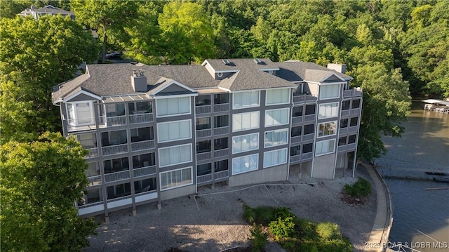 312 Windsor Bay Dr Unit 2A, Camdenton, MO 65020 - view of building exterior featuring a wooded view