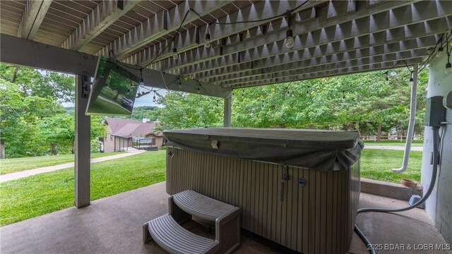 288 Oak Ridge Rd, Lake Ozark, MO 65049 - view of patio featuring a hot tub