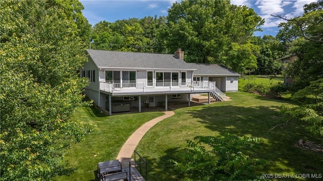 288 Oak Ridge Rd, Lake Ozark, MO 65049 - back of house with a deck, stairway, a yard, and a chimney