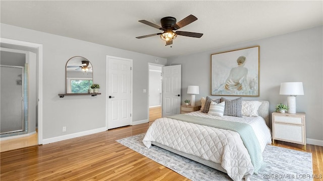 288 Oak Ridge Rd, Lake Ozark, MO 65049 - bedroom with wood finished floors and a ceiling fan