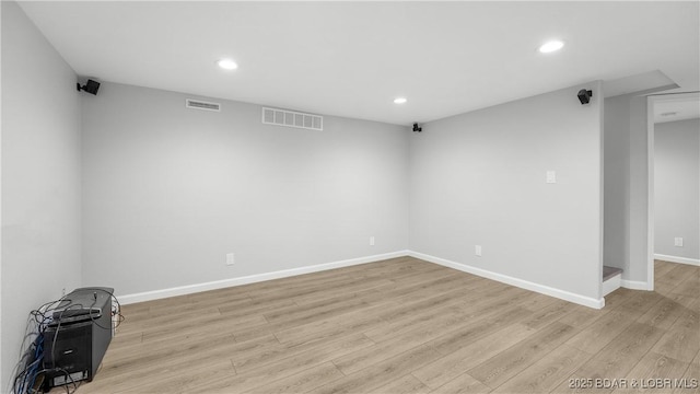 288 Oak Ridge Rd, Lake Ozark, MO 65049 - spare room with light wood finished floors, recessed lighting, and baseboards