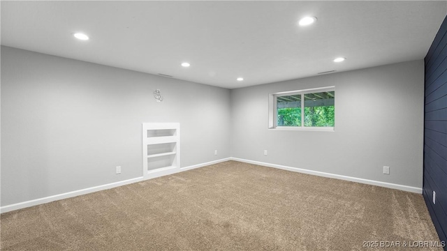 288 Oak Ridge Rd, Lake Ozark, MO 65049 - empty room with carpet, recessed lighting, built in shelves, and baseboards
