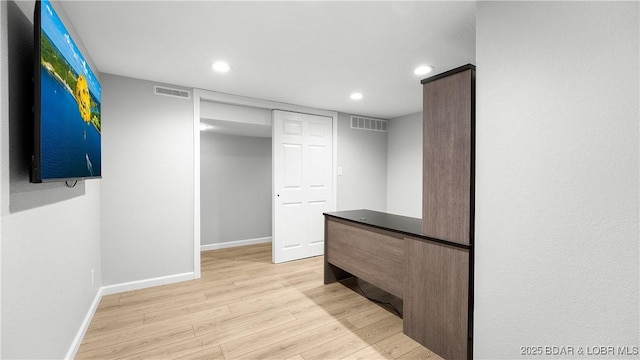 288 Oak Ridge Rd, Lake Ozark, MO 65049 - hallway with light wood finished floors, recessed lighting, and baseboards