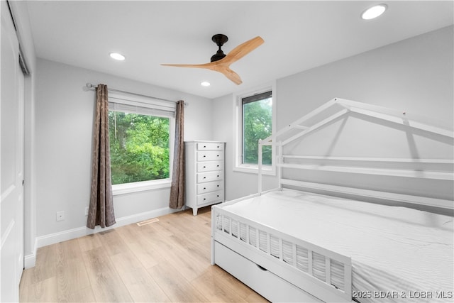 584 Black Hawk Dr, Lake Ozark, MO 65049 - bedroom featuring light wood-style flooring, multiple windows, recessed lighting, baseboards, and ceiling fan
