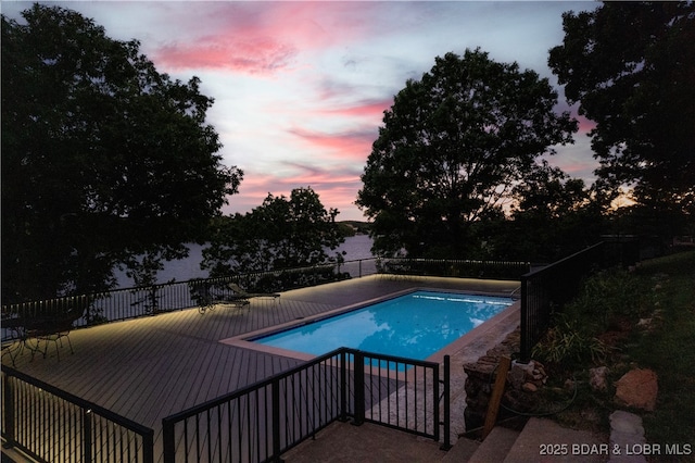 584 Black Hawk Dr, Lake Ozark, MO 65049 - view of pool at dusk