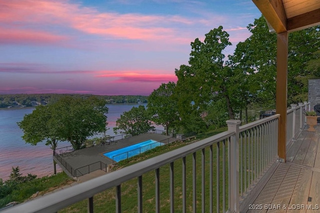 584 Black Hawk Dr, Lake Ozark, MO 65049 - balcony with a water view and view of pool