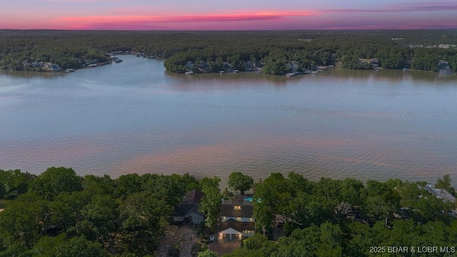 584 Black Hawk Dr, Lake Ozark, MO 65049 - aerial view at dusk of a water view and a forest view