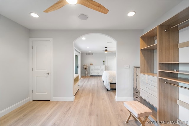 584 Black Hawk Dr, Lake Ozark, MO 65049 - kitchen featuring ceiling fan, open shelves, arched walkways, baseboards, and recessed lighting