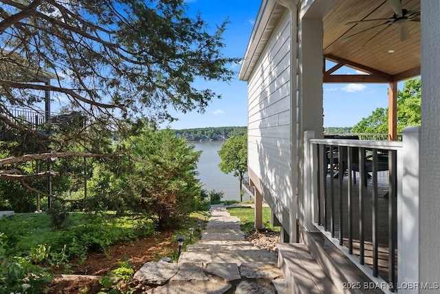 584 Black Hawk Dr, Lake Ozark, MO 65049 - view of patio with ceiling fan and a water view